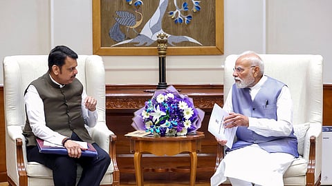 Maharashtra Chief Minister Devendra Fadnavis meets Prime Minister Narendra Modi, in New Delhi on Friday, Sept. 26, 2025.