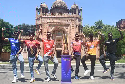 From (L) Kabaddi players Jayasoorya, Deepak Sankar, Rakesh Sungroya, Sumit Sangwan, Abinesh Nadarajan and Satish Kannan pose with the PKL trophy in front of the Egmore Museum on Sunday