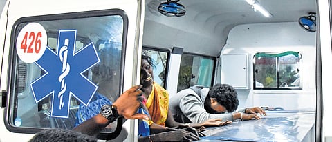 Family members were inconsolable after receiving the body of a victim who died in the campaign rally in Karur on Sunday