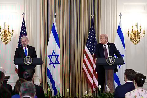 Israel's Prime Minister Benjamin Netanyahu speaks during a news conference with US President Donald Trump in the State Dining Room of the White House, Monday, Sept. 29, 2025, in Washington.