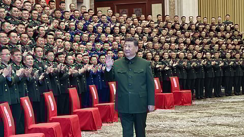 Chinese President Xi Jinping meets with representatives of military personnel stationed in Urumqi in northwestern China's Xinjiang Uyghur Autonomous Region on Tuesday, Sept. 23, 2025.