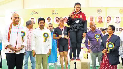 Excise Minister Kollu Ravindra presented medals to the yoga contest winners.