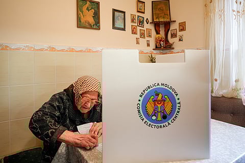 Feodora, 92 years old, who casted her vote in a mobile ballot box during a parliamentary election that took place in Durlesti village