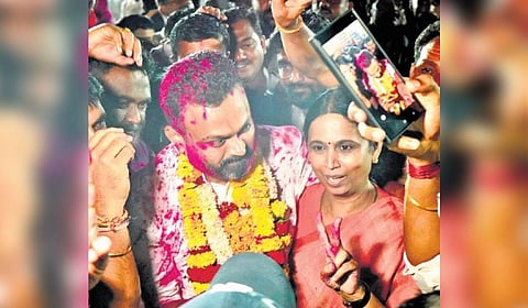 Minister Laxmi Hebbalkar and her brother MLC Channaraj Hattiholi celebrate his victory.