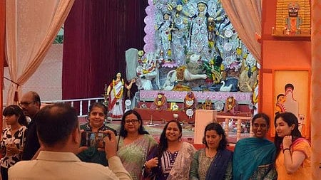 People taking photos/selfie in front of Durga Idol on its 8th Days of Puja in Kashmiri Gate.