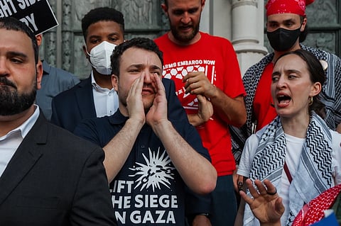 Pro-Palestinian activist Mahmoud Khalil chants during a rally celebrating his return from immigration detention, June 22, 2025, in New York.