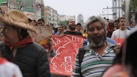 Demonstrators march during a protest commemorating the anniversary of the 1968 Tlatelolco killings, when soldiers fired on student protesters, in Mexico City, Thursday, Oct. 2, 2025.