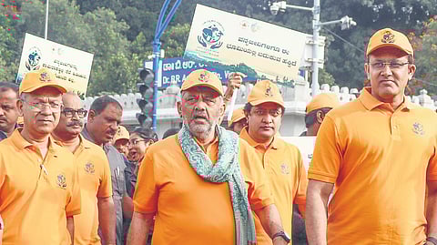 DCM DK Shivakumar, cricket legend Anil Kumble and others during the 71st Wildlife Week walkathon from Vidhana Soudha to Lalbagh on Thursday.