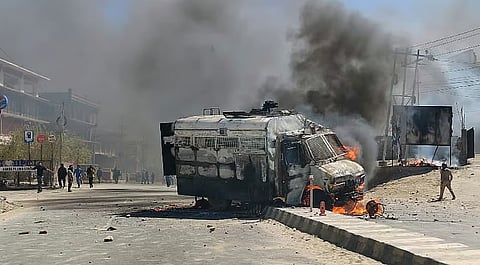 Security personnel stand guard on a road amid curfew, days after violence during protests for Ladakh statehood, in Leh.