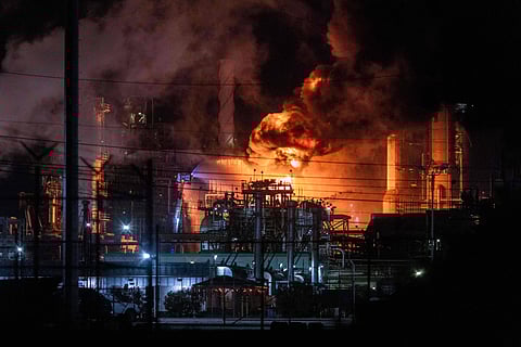 Flames rise from the Chevron refinery in El Segundo, Calif., Thursday, Oct. 2, 2025.