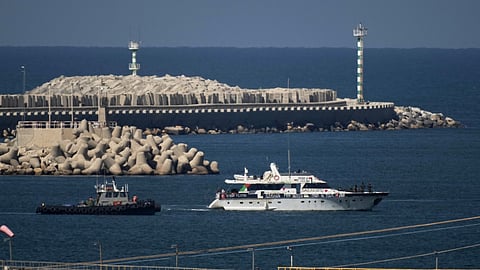 A Gaza-bound Sumud flotilla boat is escorted into the port of Ashdod, Israel, Thursday, Oct. 2, 2025, after being intercepted while approaching the Gaza coast by Israeli navy soldiers