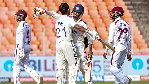 IndiaÂ’s Dhruv Jurel celebrates his century on day two of the first test cricket match between India and West Indies, at the Narendra Modi Stadium, in Ahmedabad, Gujarat, Friday, Oct. 3, 2025.