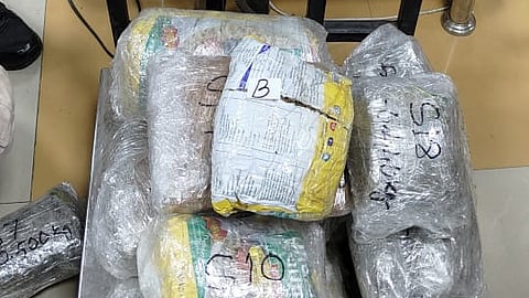 The seizure took place just before the duo was about to board an Air India Express flight to Delhi.