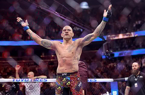 Alex Pereira, of Brazil, celebrates after defeating UFC light heavyweight champion Magomed Ankalaev, of Russia during the UFC 320 mixed martial arts bout Saturday, Oct. 4, 2025, in Las Vegas.