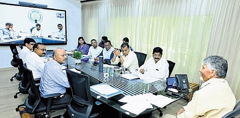Chief Minister Chandrababu Naidu is interacting with Deputy CM Pawan Kalyan through video conference during the review meeting on Sunday