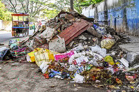 A heap of garbage and debris collected at the Bannerghatta-Hosur Road.