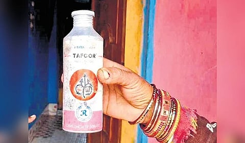 The pesticide bottle seized by police.