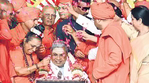 CM Siddaramaiah being felicitated during Basava Samskruti Abhiyana-2025 at Palace Grounds in Bengaluru on Sunday