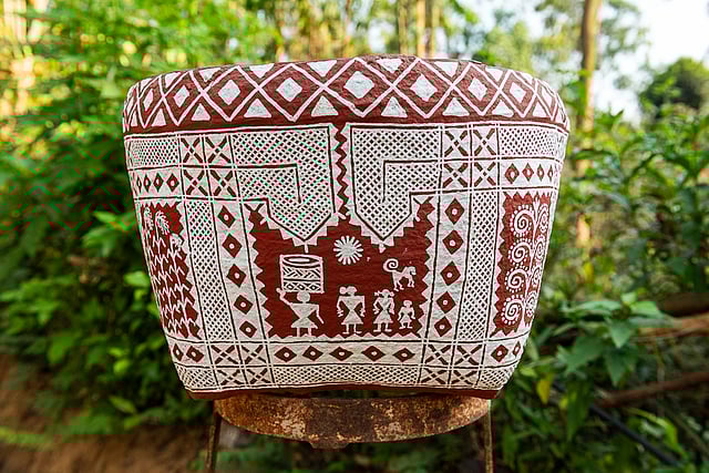 Bhoomanni basket adorned with chittara art narrating a story of the harvest
