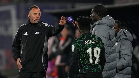 Nigeria's coach Aliyu Zubair asks for a VAR review to referee Joao Pinheiro, of Portugal, during a FIFA U-20 World Cup Group F soccer match against Colombia at Fiscal Stadium in Talca, Chile, Sunday, Oct. 5, 2025.