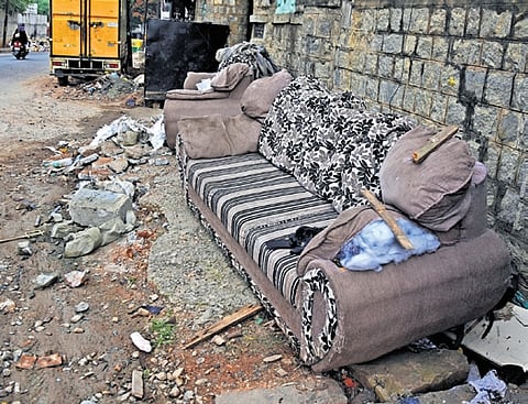An old couch was found discarded on Netaji Road on Wednesday