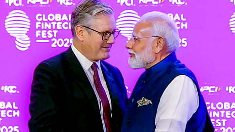 Prime Minister Narendra Modi with his British counterpart Keir Starmer at the Global Fintech Fest 2025, in Mumbai.