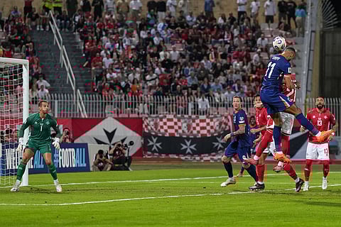 Cody Gakpo of the Netherlands heads the ball during a World Cup 2026 group G qualifying soccer match between Malta and the Netherlands in Ta' Qali, Malta, Thursday, Oct. 9, 2025.