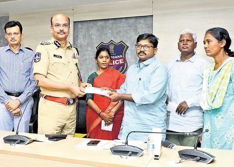Maoist leaders surrender before DGP B Shivadhar Reddy in Hyderabad on Friday