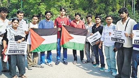 Holding placards and banners, students stood together to express their concern over the suffering of civilians in the region.