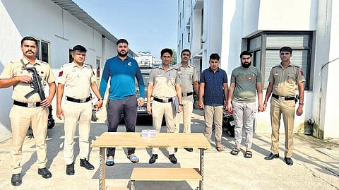 Delhi police with the arrested accused.