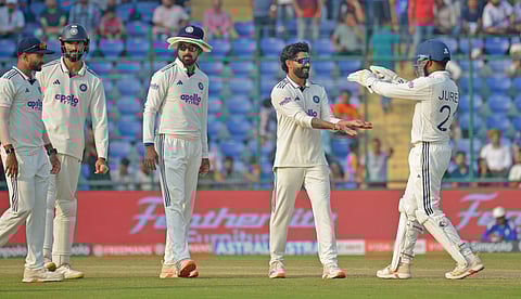 Ravindra Jadeja (2nd R) was the pick of the bowlers for India on Day 2