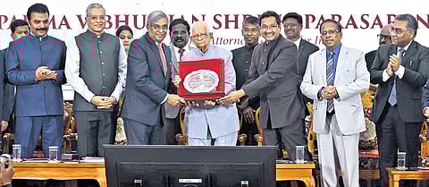 SC Judges Vikram Nath and M M Sundresh present a memento to Padma Bhushan awardee senior counsel K Parasaran in Chennai on Saturday