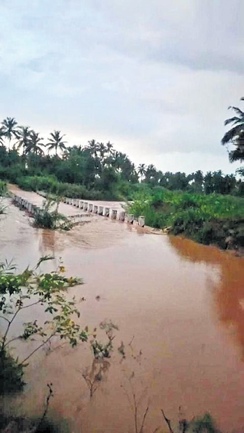 A lake in Omadheypalli overflowed onto the road.