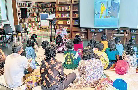 Children and parents engage in a session at the children's library