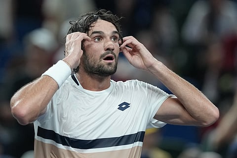 Valentin Vacherot of Monaco reacts after defeating Novak Djokovic of Serbia in the men's singles semifinal match of the Shanghai Masters tennis tournament at Qizhong Forest Sports City Tennis Center, in Shanghai, China, Saturday, Oct. 11, 2025.