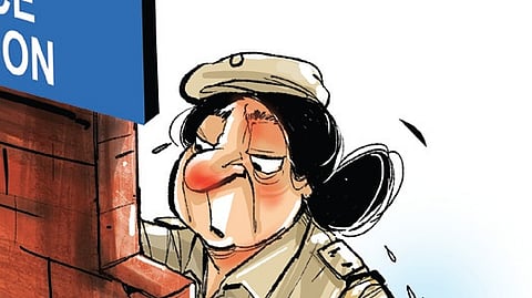 The woman police officer's uniform was torn by a group of drunken men after one of them held her by the collar.