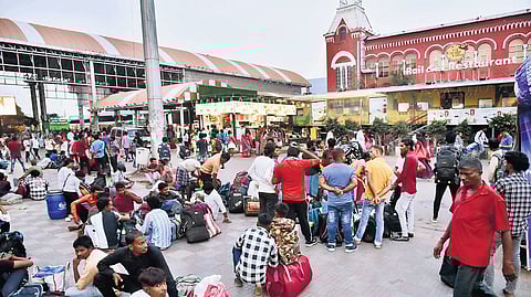 Passengers waiting at the Chennai Central railway station on Sunday