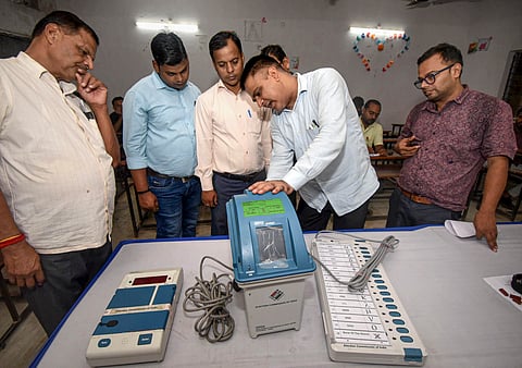 Election officials attend a training session ahead of the Bihar Assembly elections, in Patna, Thursday, Oct. 9, 2025.
