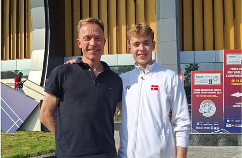 Peter Rasmussen (R) with son Simon