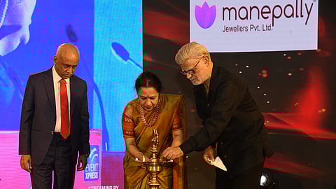National Human Rights Commission Chairperson and former judge of the Supreme Court Justice V Ramasubramanian lighting the lamp alongside CEO, TNIE Lakshmi Menon and Editorial Director, TNIE Prabhu Chawla