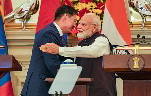 Prime Minister Narendra Modi with Mongolian President Khurelsukh Ukhnaa during a joint press statement at Hyderabad House, in New Delhi, Tuesday, Oct. 14, 2025.