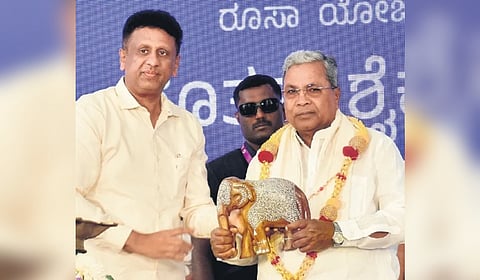 Chief Minister Siddaramaiah and Higher Education Minister MC Sudhakar during the inauguration of a building of Nrupatunga University on Tuesday.