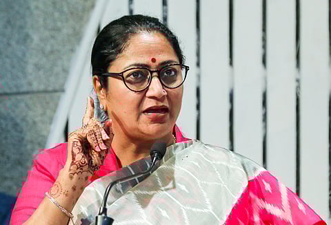 Delhi Chief Minister Rekha Gupta addresses the gathering during the launch of Late Payment Surcharge Waiver Scheme and the Unauthorized Connection Regularization Scheme, in New Delhi, Tuesday, Oct. 14, 2025.
