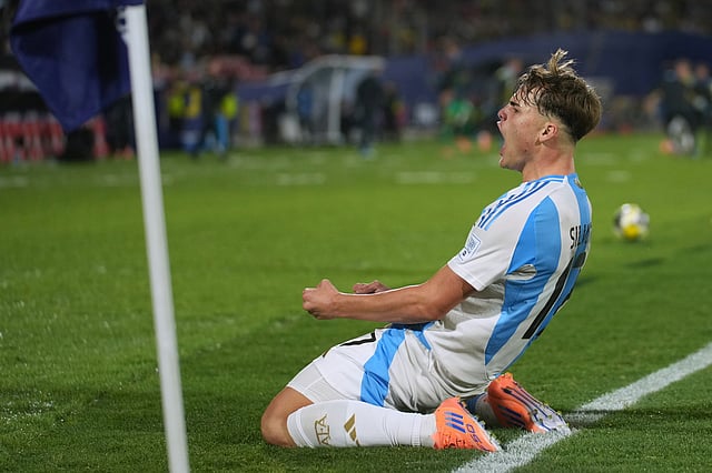 Argentina's Mateo Silvetti celebrates scoring his side's opening goal against Colombia during a FIFA U-20 World Cup semifinal soccer match at National Stadium in Santiago, Chile, Wednesday, Oct. 15, 2025