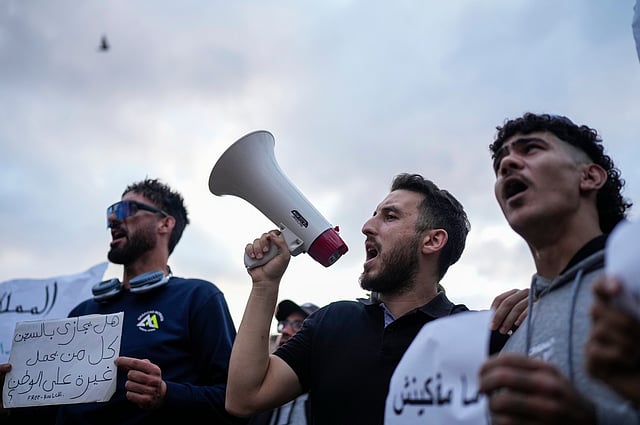 People take part in a youth-led protest against corruption and calling for education and healthcare reforms, in Rabat, Morocco, Thursday, Oct. 9, 2025.