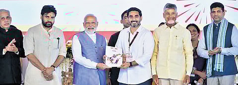 Prime Minister Narendra Modi, Chief Minister Nara Chandrababu Naidu, Deputy CM Pawan Kalyan, HRD Minister N Lokesh and Governor S Abdul Nazeer during the Super GST - Super Savings public meeting in Kurnool.