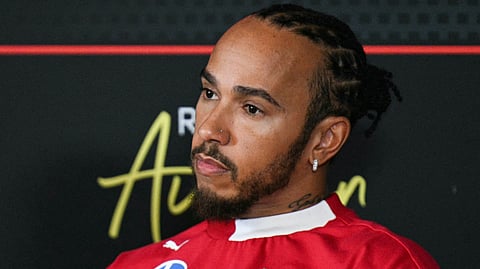 Ferrari's British driver Lewis Hamilton looks on during a news conference ahead of the United States Formula One Grand Prix at the Circuit of the Americas in Austin, Texas, on October 16, 2025.
