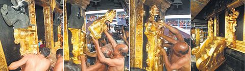 The gold plates that were removed from the dwarapalakas at Sabarimala Sreekovil for gold plating in Chennai, being reinstated at the sreekovil on Friday