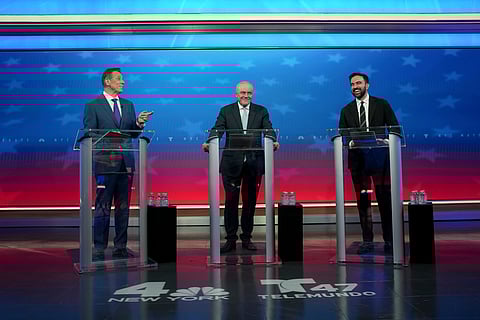From left, mayoral candidates, Independent candidate Andrew Cuomo, Republican candidate Curtis Sliwa, and Democratic candidate Zohran Mamdani participate in a debate, Thursday, Oct. 16, 2025, in New York.