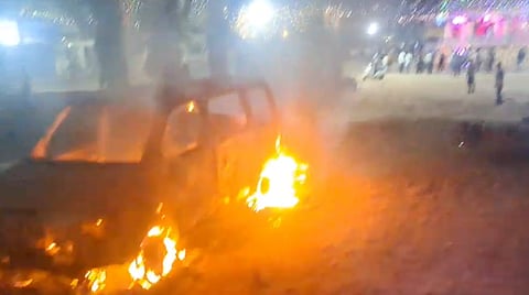 A car was set aflame during the clash, after which the fire brigade was called to douse the flames.